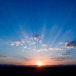 Scenic view of silhouette landscape against sky during sunset