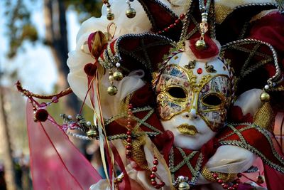 Close-up of person wearing venetian mask during carnival
