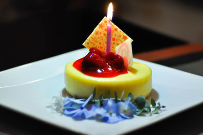 Close-up of cake served on table