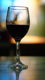 Close-up of wineglass on table