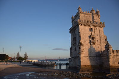 View of historic building at beach