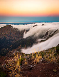 Scenic view of sea against sky during sunset