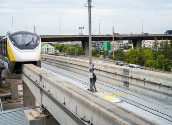 Elevated monorail train on rail. public transit monorail. modern mass transit. rail transportation.