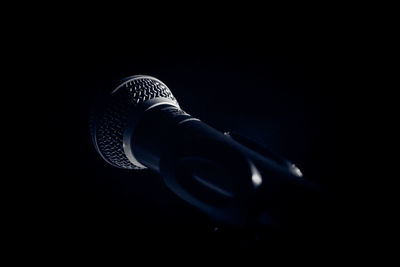 Close-up of microphone in darkroom