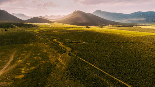 Scenic view of landscape against sky during sunset