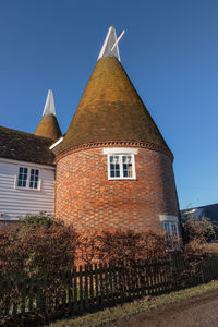 Low angle view of building against clear sky