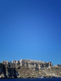 View of fort against clear blue sky