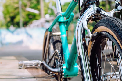 Close-up of bicycle on street