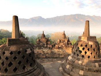 Ancient temple against sky