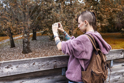 Side view of a woman drinking water