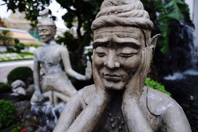 Close-up of statue in water