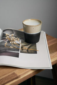 High angle view of coffee cup on table