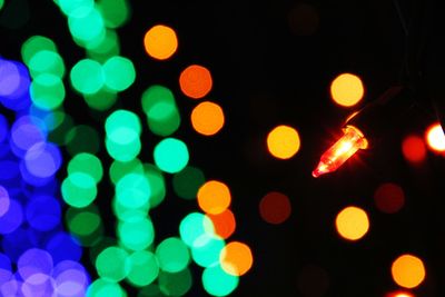 Defocused image of illuminated light bulb