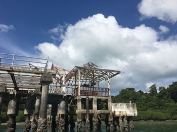 Low angle view of construction site against sky