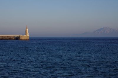 Scenic view of sea against clear sky