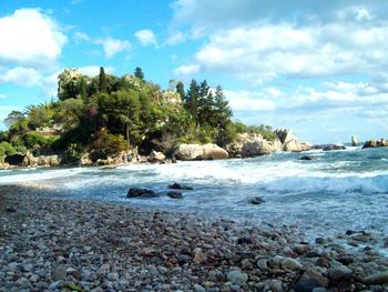 Scenic view of beach against sky