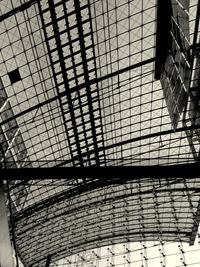 Low angle view of glass ceiling at railroad station