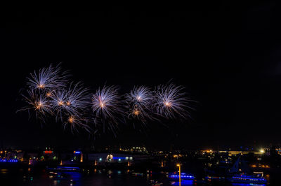 Firework display at night