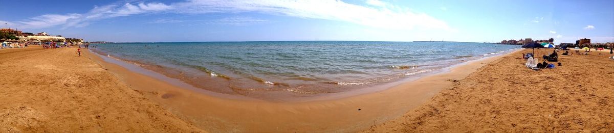 Panoramic view of beach against sky