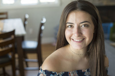 Portrait of smiling young woman