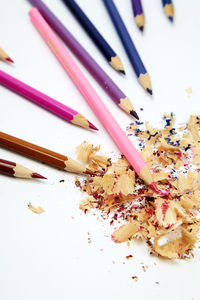 High angle view of multi colored pencils on table