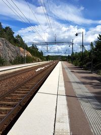 Railroad tracks against sky