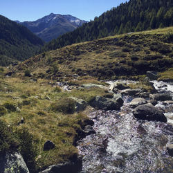 Scenic view of rocky mountains against sky