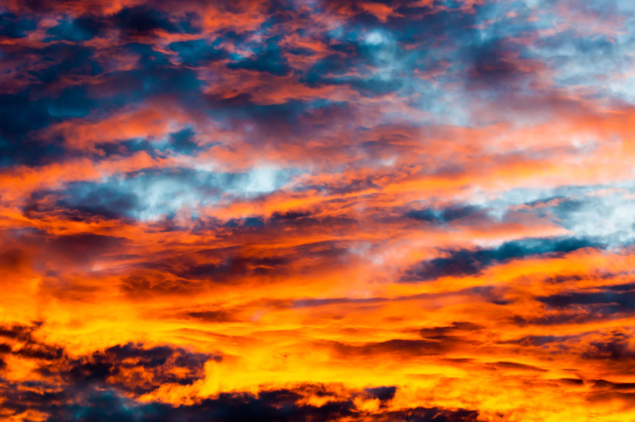 sunset, sky, orange color, cloud - sky, beauty in nature, scenics, low angle view, tranquility, dramatic sky, tranquil scene, nature, cloudy, backgrounds, cloudscape, idyllic, sky only, cloud, majestic, full frame, weather