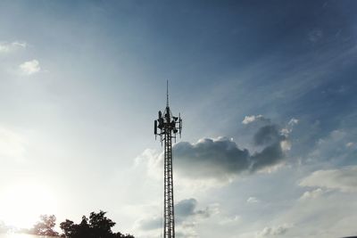 Low angle view of communications tower against sky