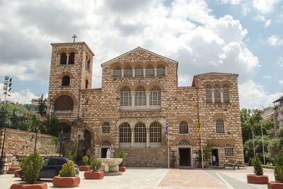 Facade of historic building against sky