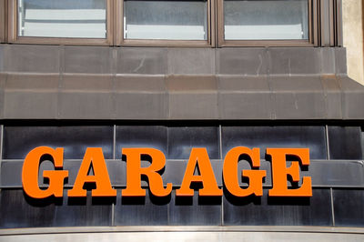 Low angle view of text garage on building