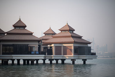 View of built structures against clear sky