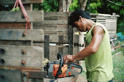 Side view of man working