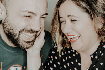 Close-up of cheerful couple