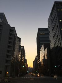 View of skyscrapers at sunset