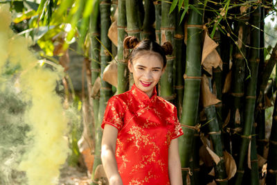 Young woman standing outdoors