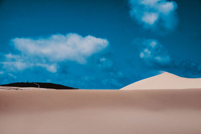 Scenic view of desert against sky