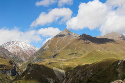 Panoramic view of mountains against sky