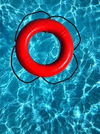 High angle view of inflatable ring on swimming pool