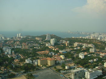 High angle view of buildings in city against sky