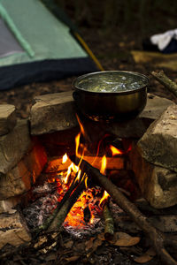 Water boiling on utensil over fire 