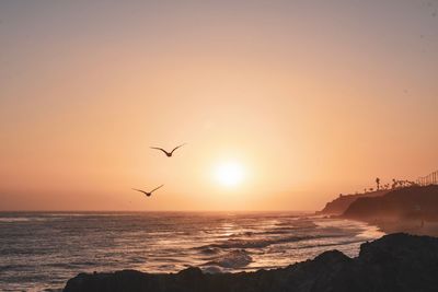 View of sea against sky during sunset