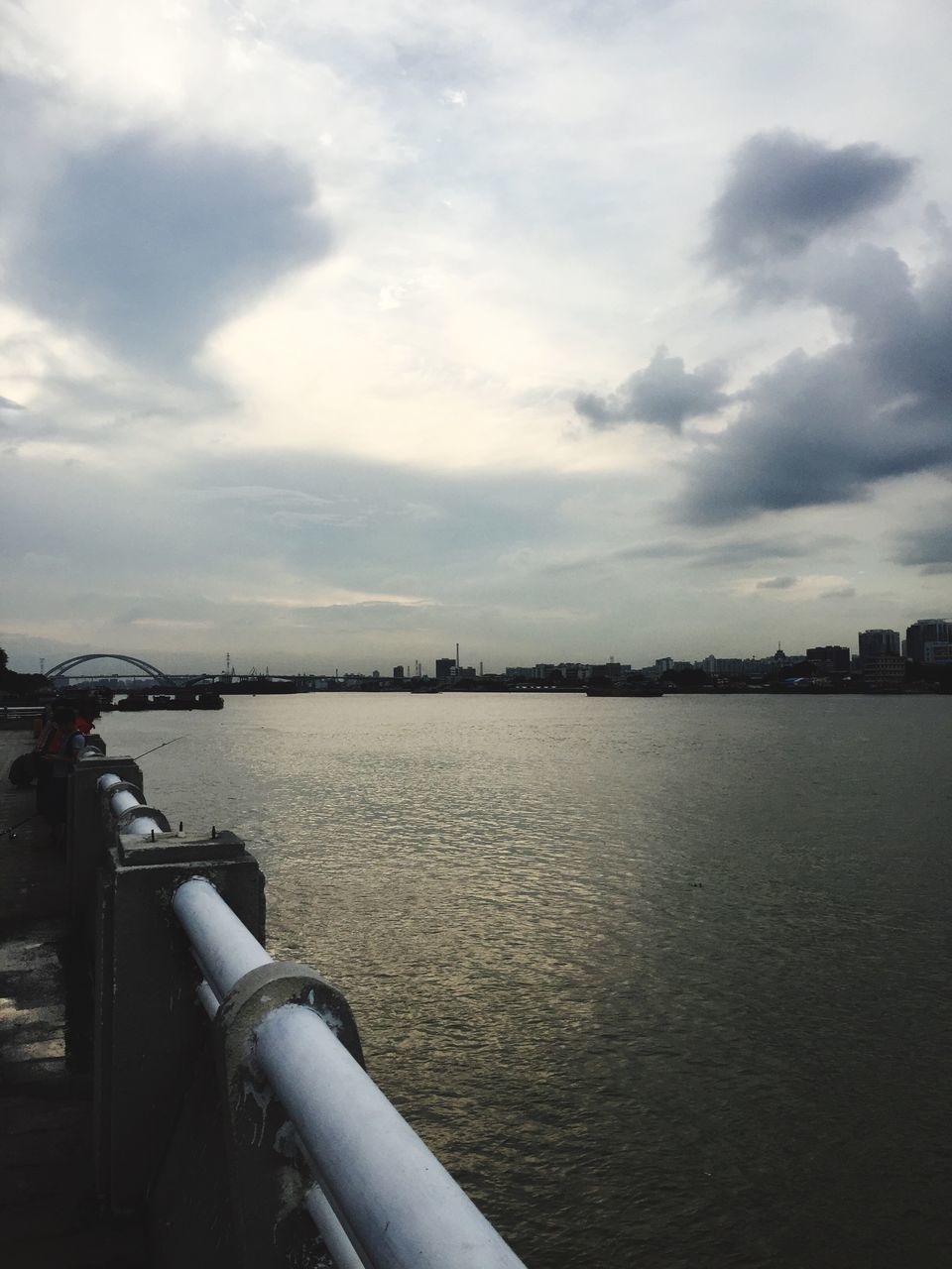 water, sky, cloud - sky, sea, river, cloud, tranquility, nature, cloudy, tranquil scene, nautical vessel, scenics, built structure, transportation, beauty in nature, outdoors, rippled, architecture, no people, day