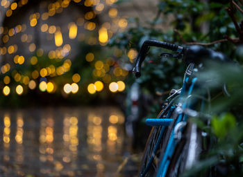 Close-up of wet bicycle during rainy season
