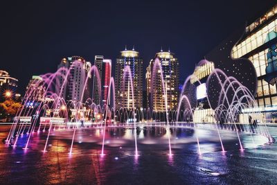 Illuminated city at night