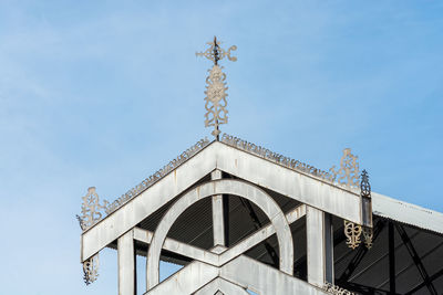 Low angle view of building against blue sky