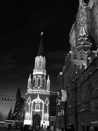 Low angle view of illuminated building at night