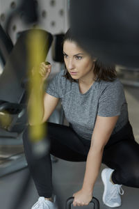 Woman exercising in gym