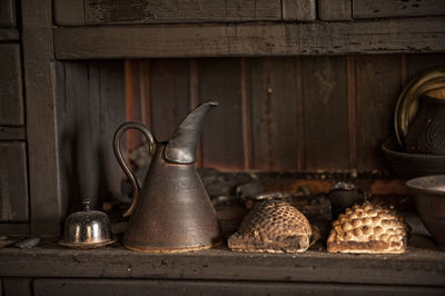 Close-up of old equipment on table