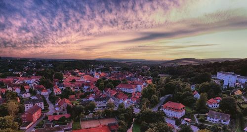 High angle view of town against cloudy sky